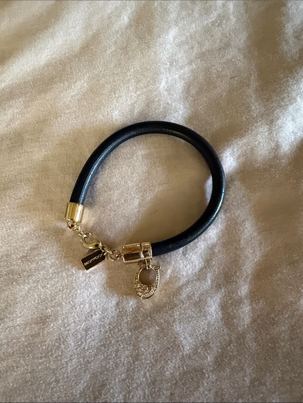 Coach Black Leather Bracelet with Gold-Tone Charms